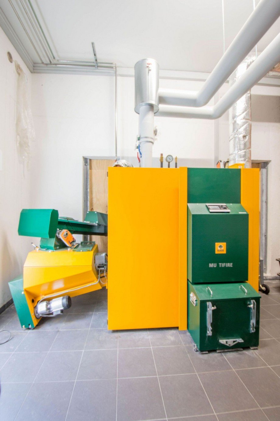 Hackgutkessel 120 kW Etagenwohnung Calw